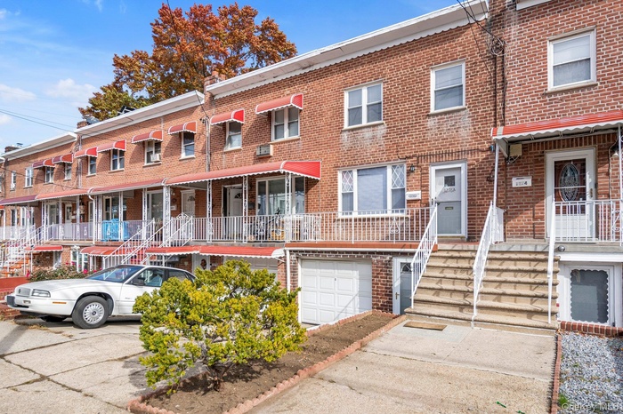 View of front of property with brick siding
