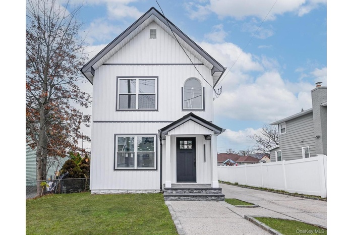 View of modern farmhouse style home
