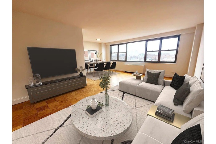 Living area featuring baseboards