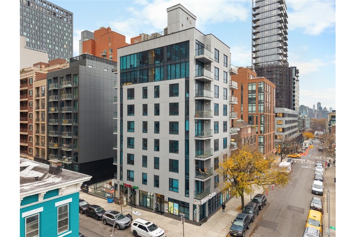 View of apartment building / complex featuring a view of city