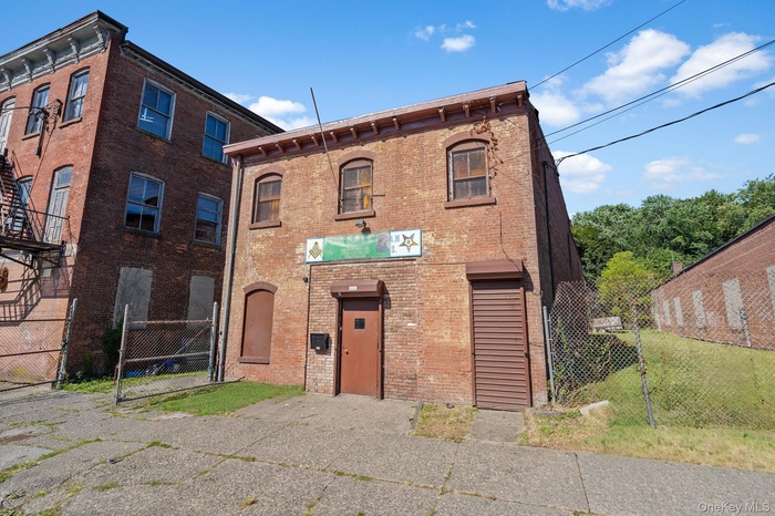 View of front facade with brick siding