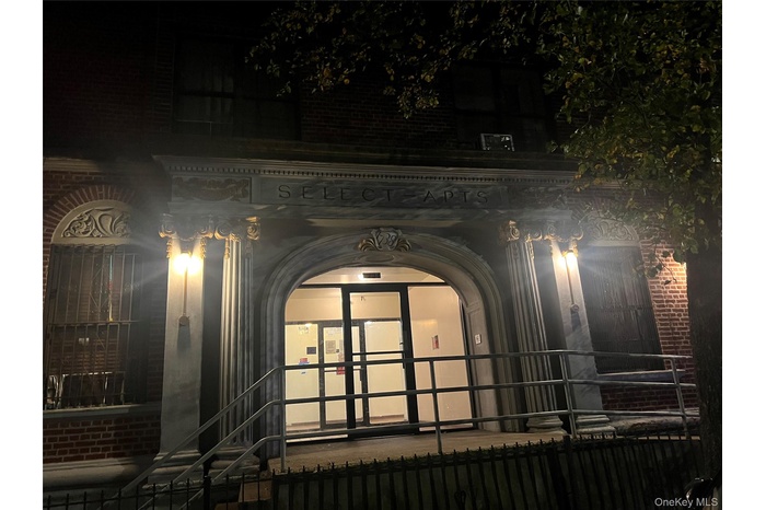 Detailed view of brick siding and arched walkways