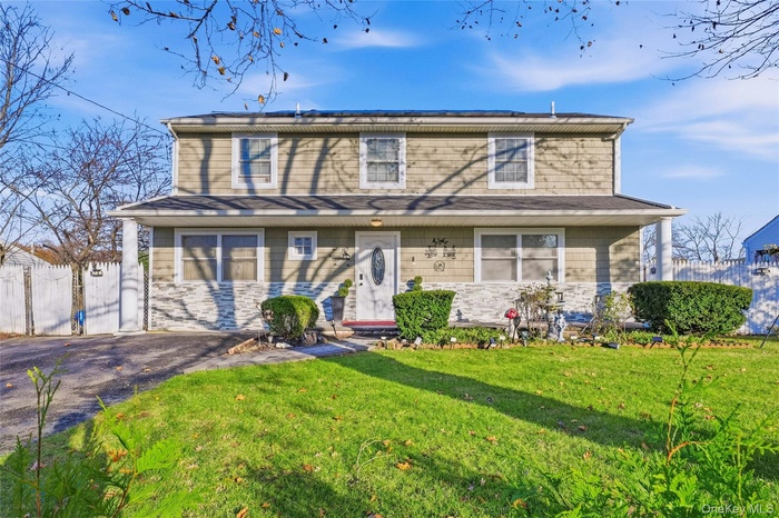 View of front of home featuring stone siding