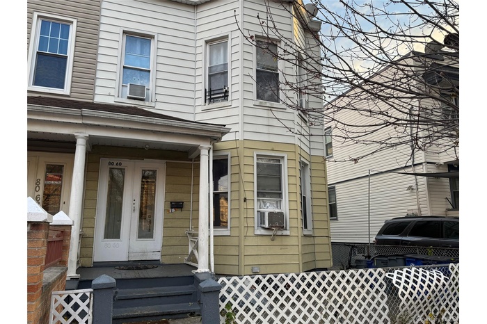 View of front of home with covered porch