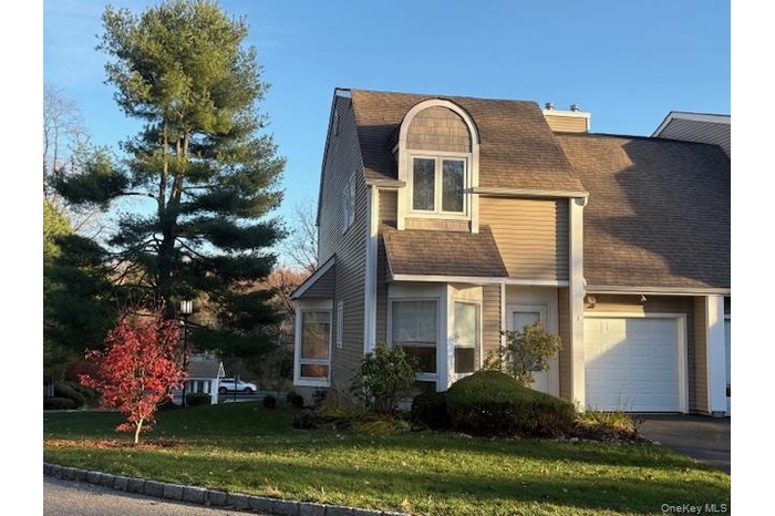 View of front of home featuring an attached garage