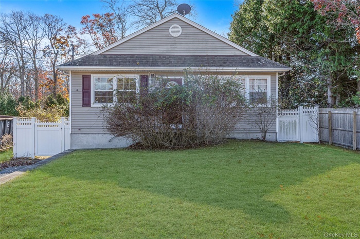 View of front of property featuring roof with shingles