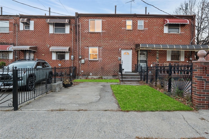 Traditional home with brick siding