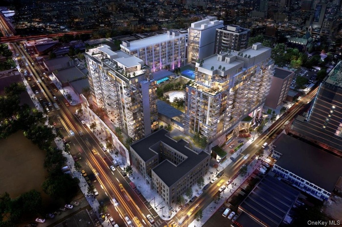 Aerial view of property's location featuring nearby urban area