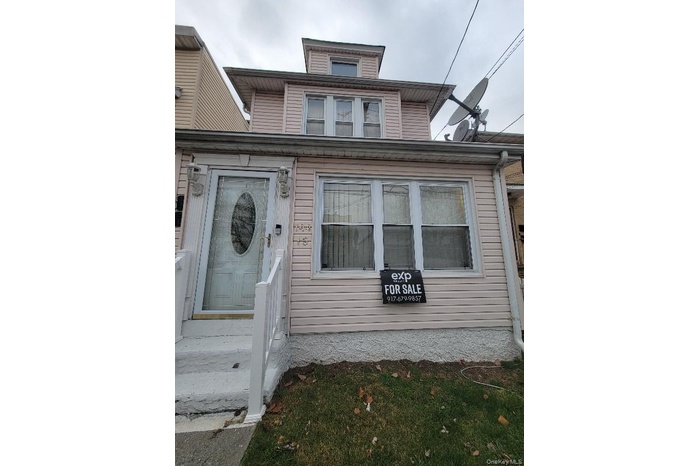 View of front facade featuring entry steps