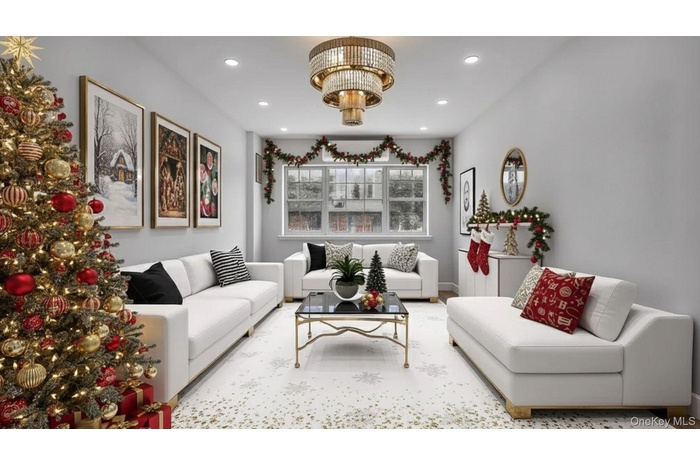 Living room with a chandelier and recessed lighting