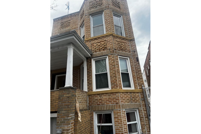 View of home's exterior with brick siding