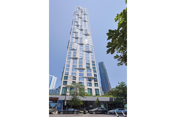 View of building exterior featuring a city view