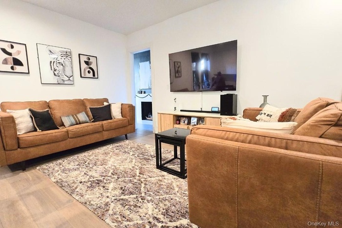 Living room featuring wood finished floors