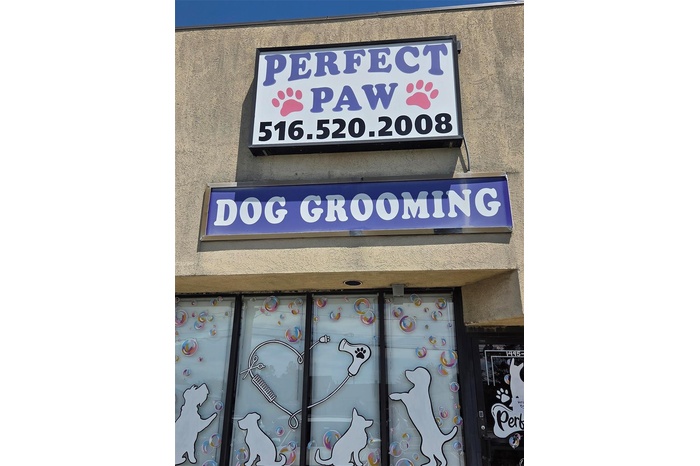 Exterior view of pet washing station and stucco siding