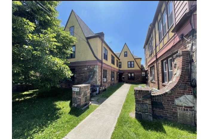 View of home's community featuring a lawn