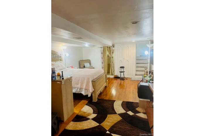 Bedroom featuring light wood-style floors