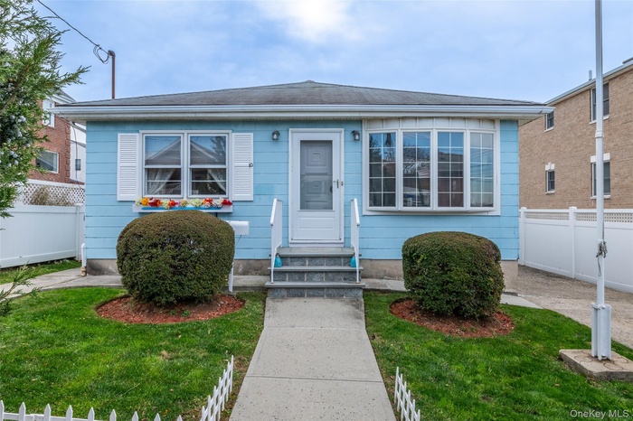 Bungalow-style home featuring entry steps