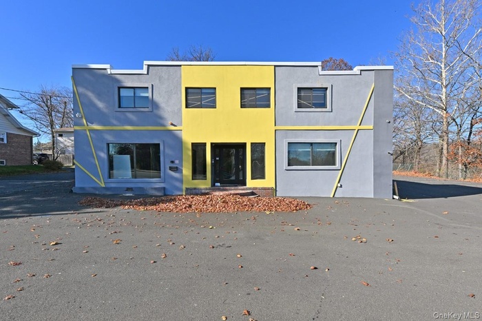 Back of property with stucco siding