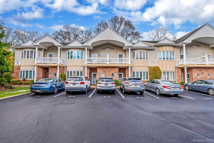 View of building exterior with a residential view