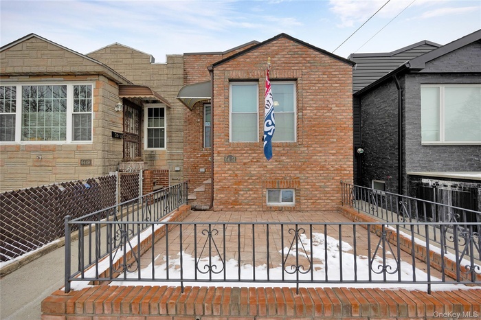 View of front of home with brick siding