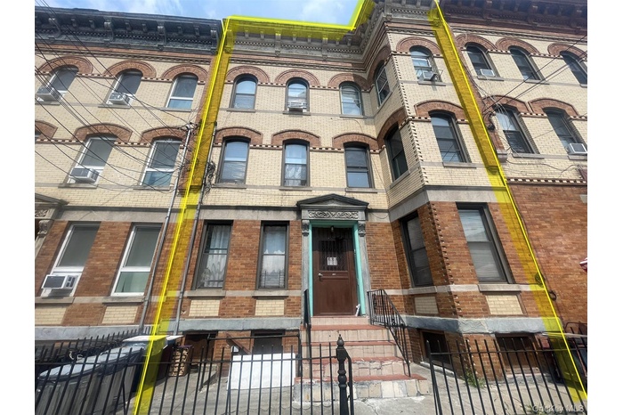 View of property with a fenced front yard