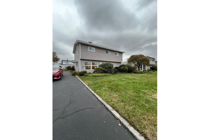 View of front of home with a front lawn