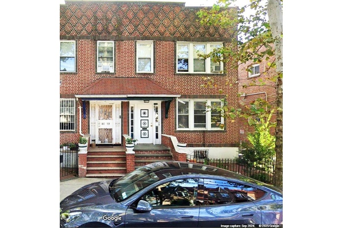 Traditional home with brick siding