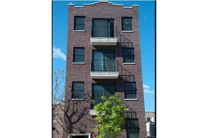 View of apartment building / complex