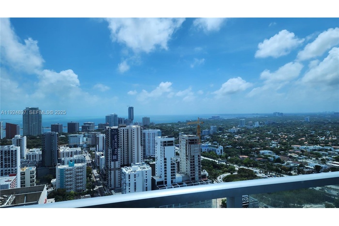 This location boasts open, unobstructed and beautiful views of the water and city. The balcony faces south. All of this plus an excellent location.