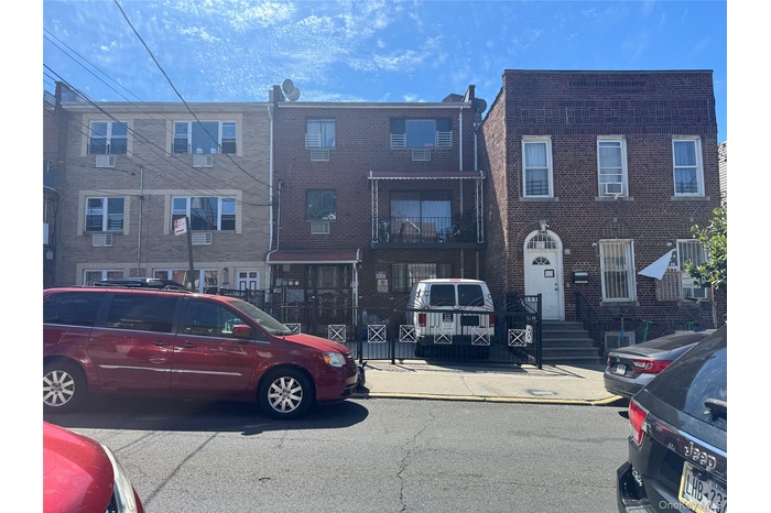 View of front facade featuring brick siding