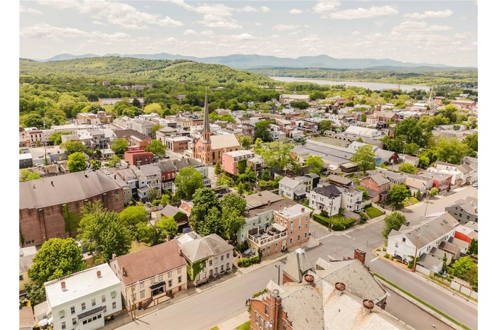 Aerial perspective of suburban area with mountains
