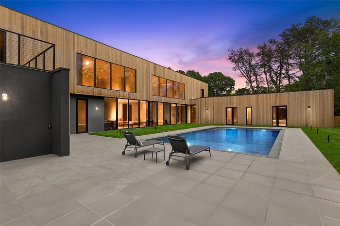 Swimming pool with a patio area