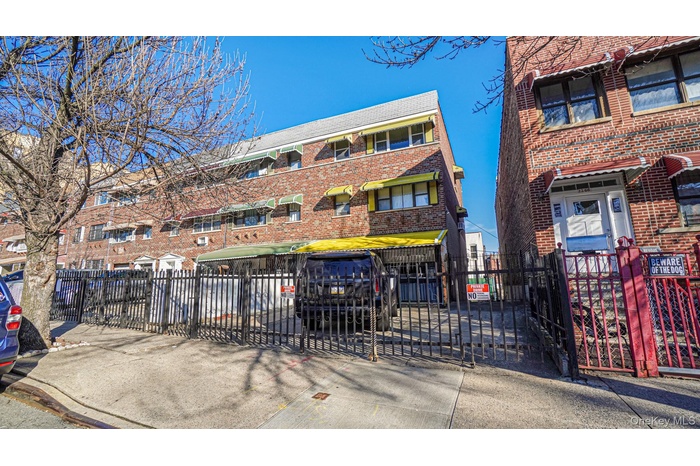 View of front facade featuring brick siding