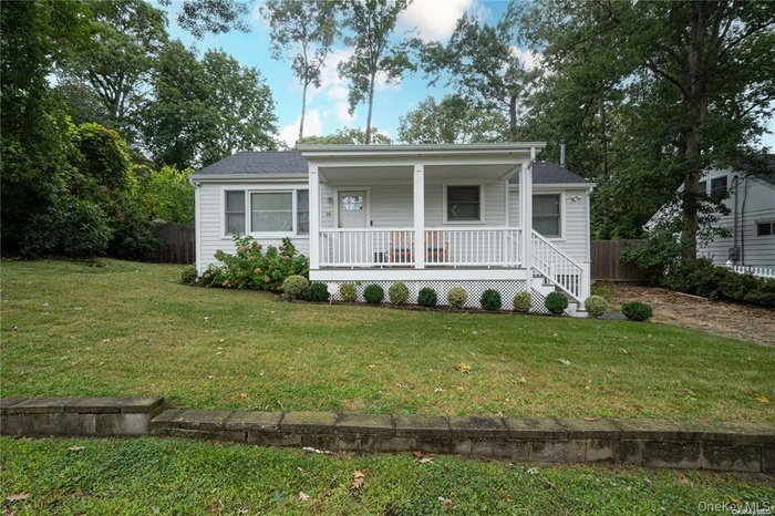 View of front of property featuring covered porch