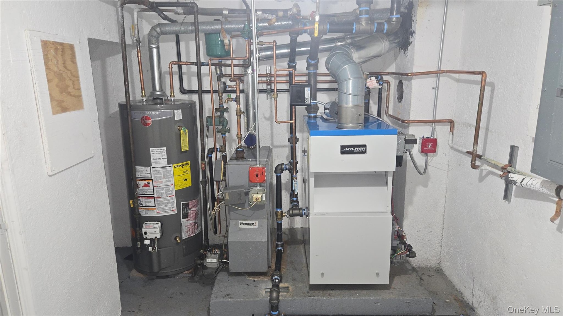 Utilities featuring water heater, a heating unit, and electric panel
