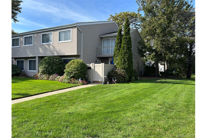 View of front of property featuring a balcony