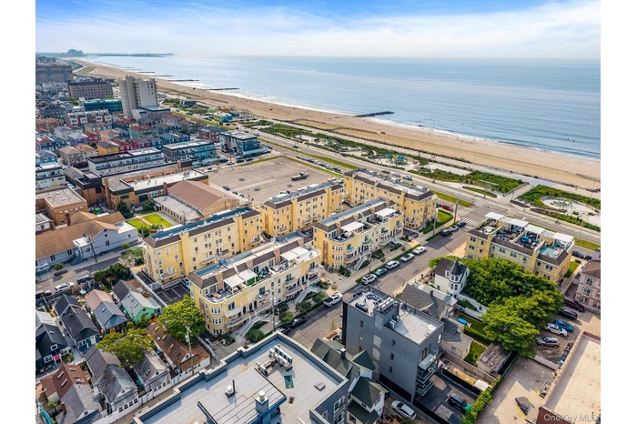 View of urban area featuring extended coastline