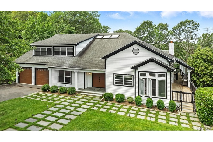 Welcome to 6 Eaton Lane, Scarsdale (Edgemont School District). Spectacular contemporary set on nearly half acre of private property