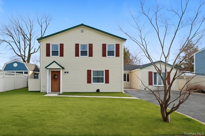 Traditional-style home with driveway