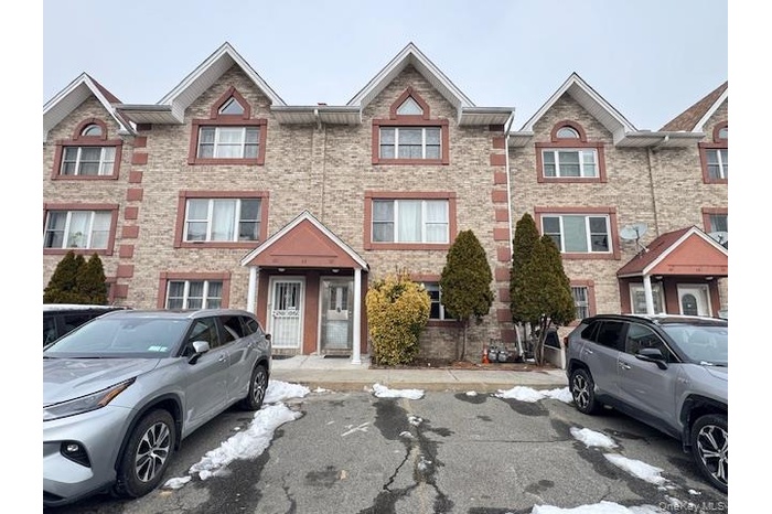 View of front facade with brick siding