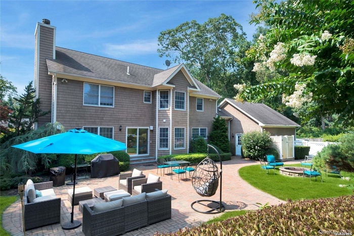 Expansive paved patio and sitting area