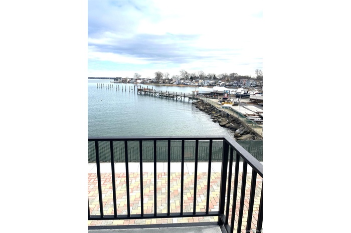 Water view with a dock