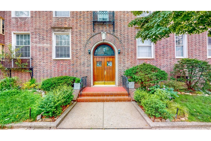 Property entrance with brick siding