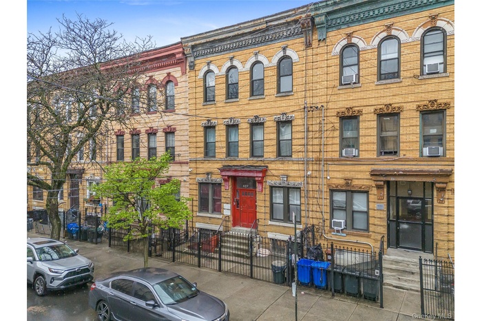 View of front of house with brick siding
