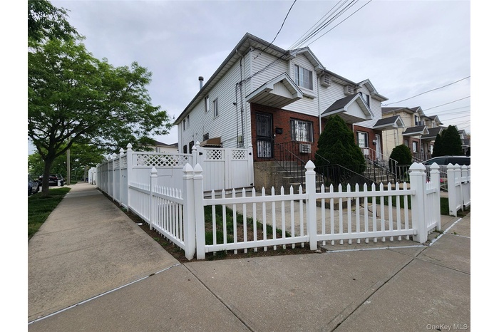 View of front of house with a fenced front yard