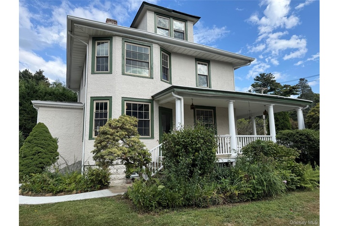 Front of house with a granny porch