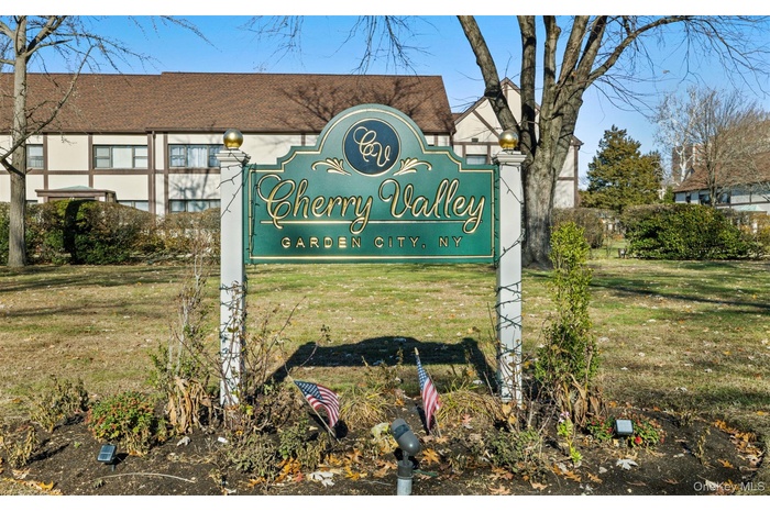 Community sign with a lawn
