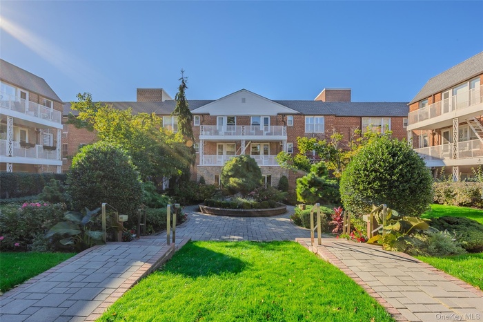 View of community with a yard