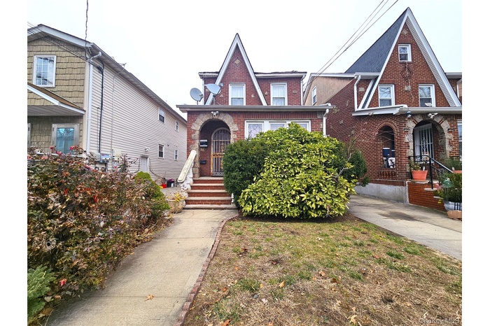 Tudor house with brick siding