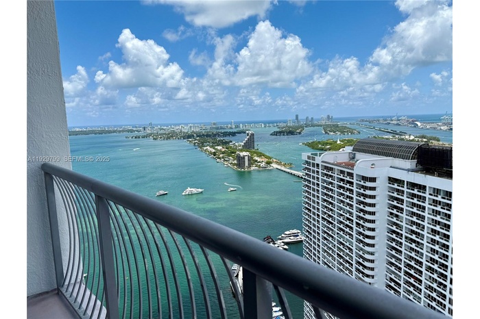 Stunning high-rise bay and city views overlooking Biscayne Bay and Miami skyline — ideal for sunset lovers searching for waterfront luxury living.
